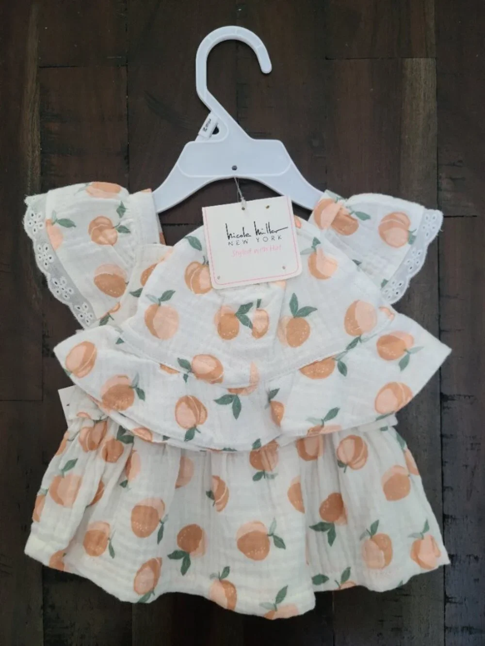 Nicole Miller shirt hat